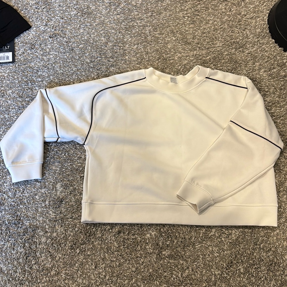 Soft, light weight off white crop